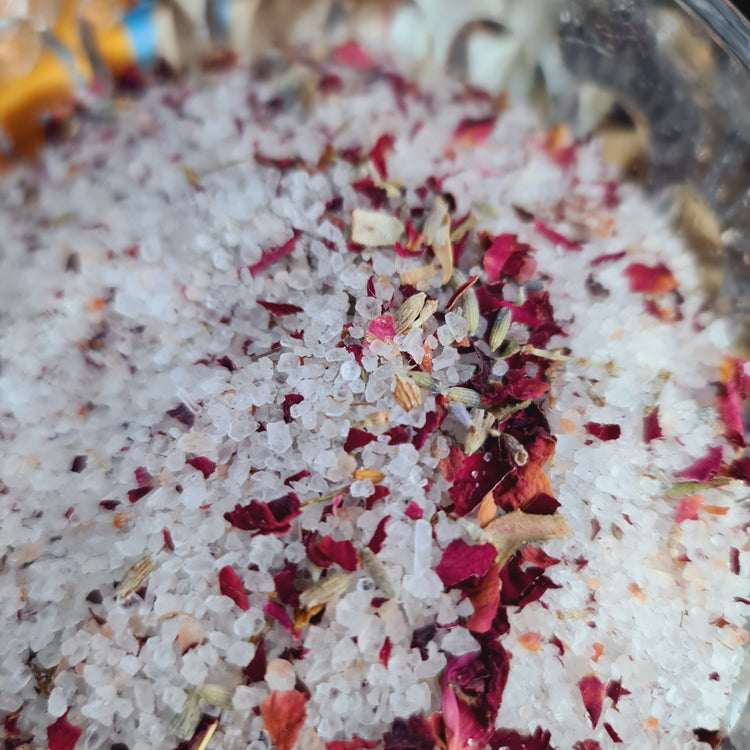 Close up of Salt Bath Blend, including rose petals and lavender mixed in.